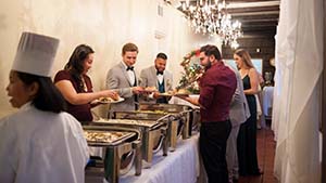 Guests serving themselves in a buffet
