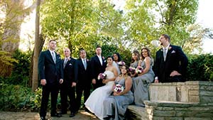 Wedding Party by the Stone Bench