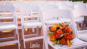 Outside White Chairs with Flower Bouquet